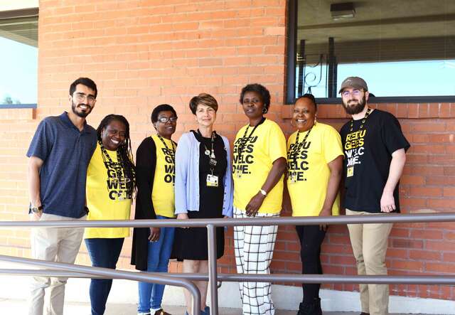 Senada Kadich poses with the resettlement team.